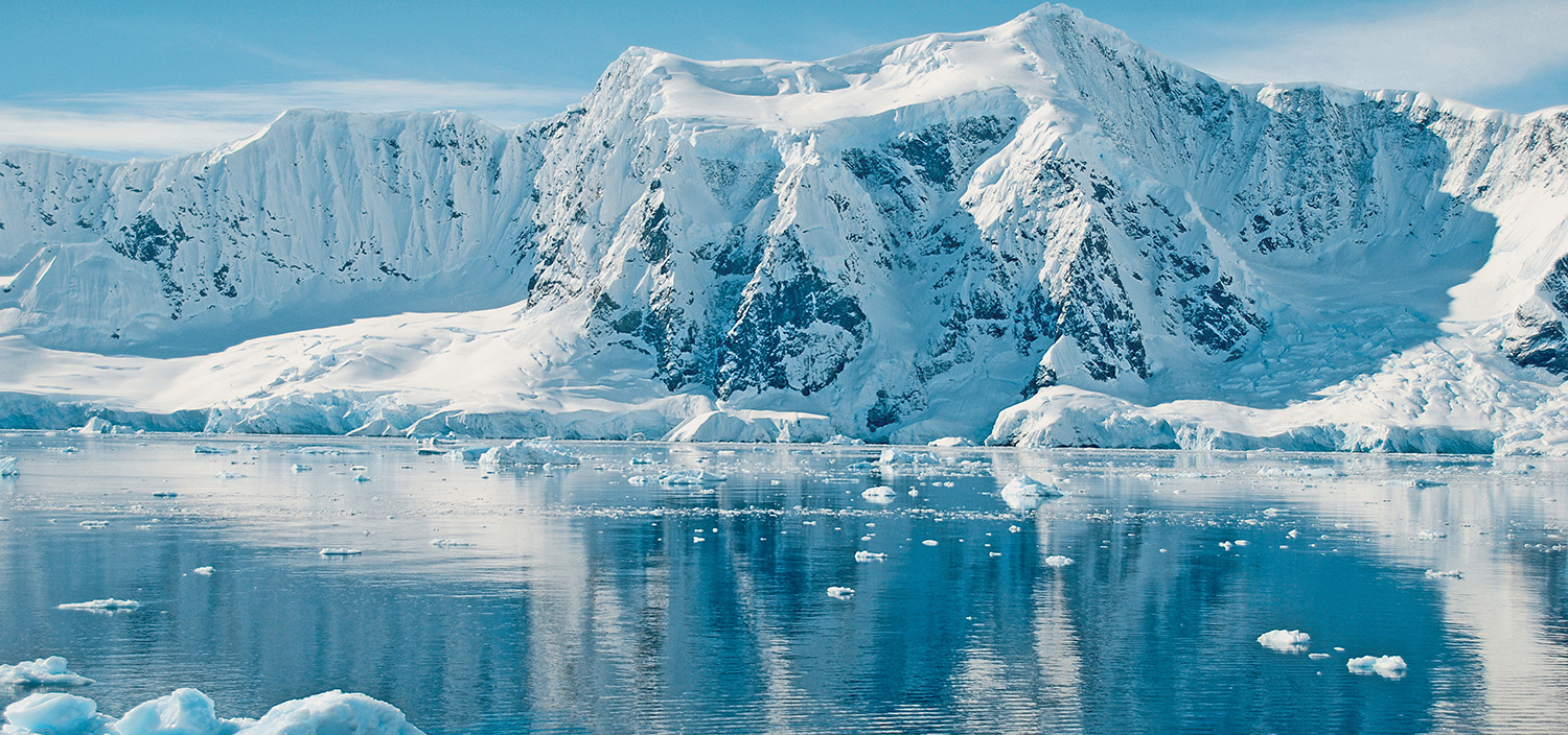Antarctica yacht charter sail past huge icebergs